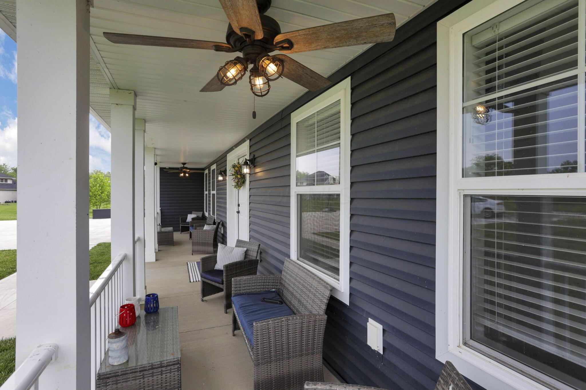 9559 Basil Road Northwest Baltimore, OH 43105 - Photo 6 of 44 Front Porch Right