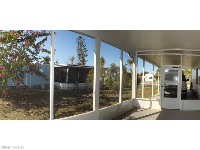 219 Rookery Road, Unit 219 Naples, FL 34114 - Photo 7 of 8 LOWER SCREENED LANAI