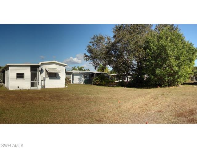 219 Rookery Road, Unit 219 Naples, FL 34114 - Photo 8 of 8 BACK OF HOME & BACK YARD