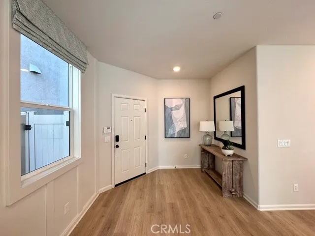 a view of a kitchen from the hallway