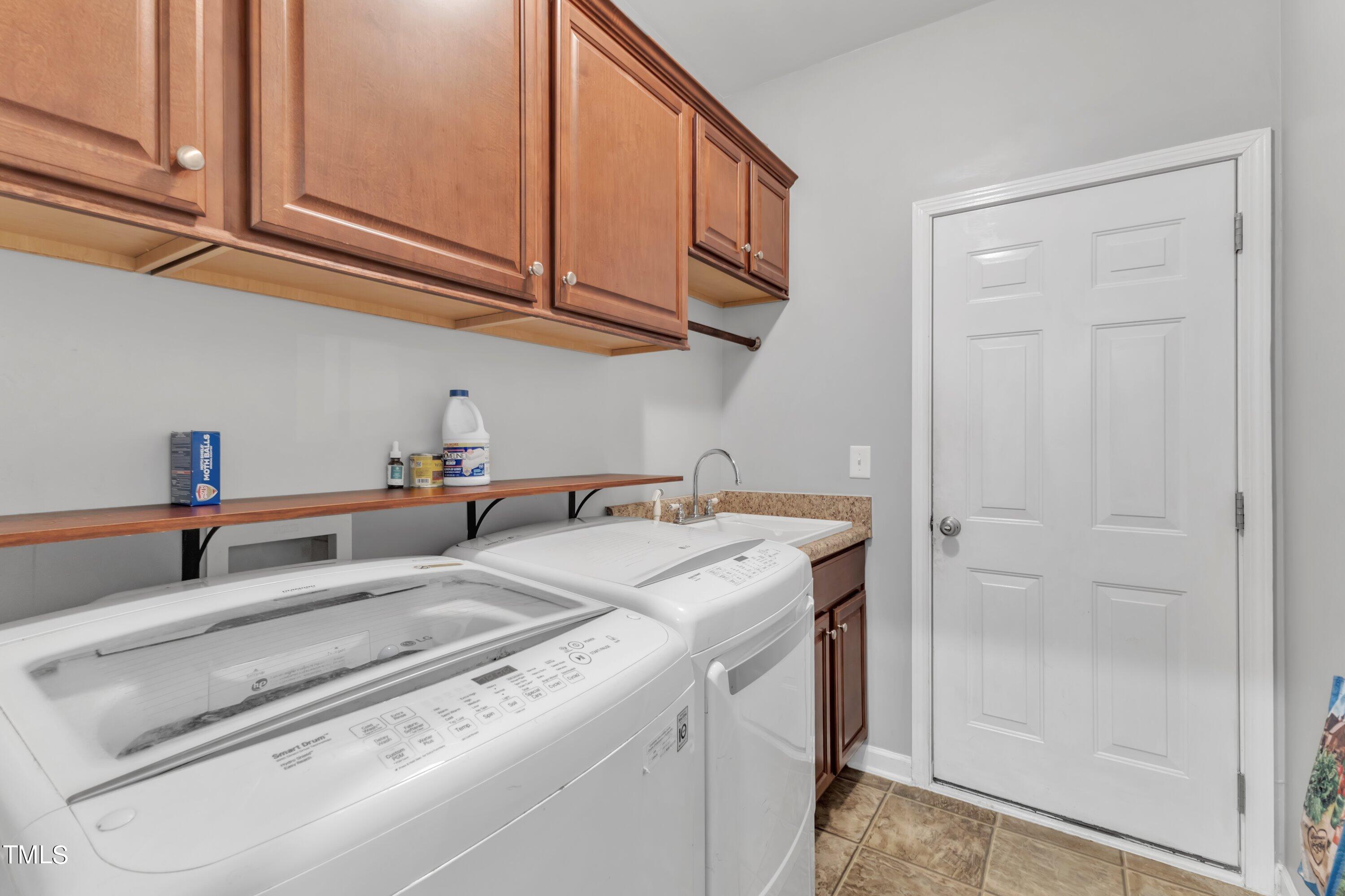7719 Berry Crest Avenue Raleigh, NC 27617 - Photo 33 of 58 Laundry room
