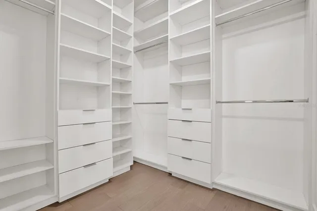a view of an empty walk in closet