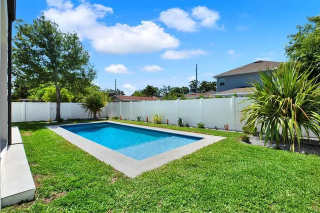 a kitchen with a sink and a stove
