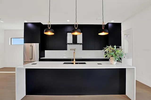 a kitchen with a sink and a cabinets