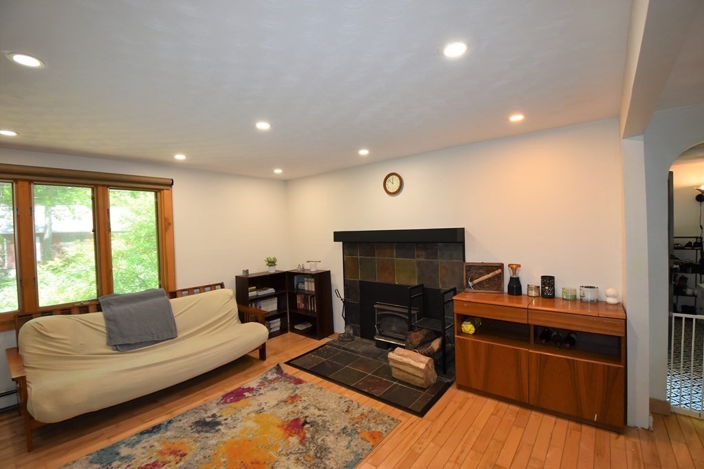 20 Amherst Road Hopkinton, MA 01748 - Photo 13 of 27 a living room with furniture and a fireplace
