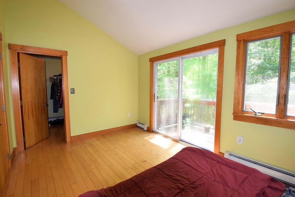 20 Amherst Road Hopkinton, MA 01748 - Photo 17 of 27 a bedroom with a bed and a window