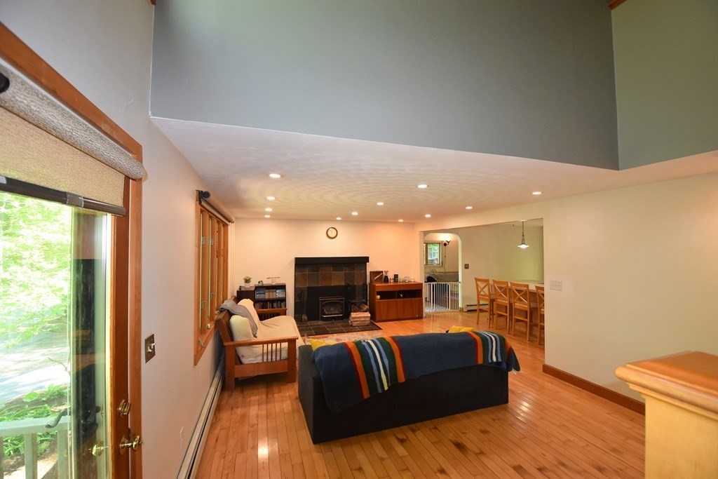 20 Amherst Road Hopkinton, MA 01748 - Photo 2 of 27 a view of living room with furniture and a flat screen tv