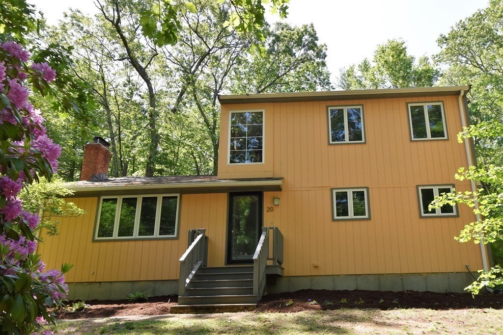 20 Amherst Road Hopkinton, MA 01748 - Photo 21 of 27 a view of house with backyard