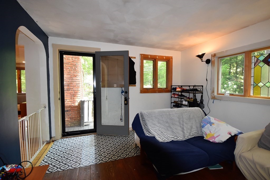 20 Amherst Road Hopkinton, MA 01748 - Photo 7 of 27 a living room with furniture and a window