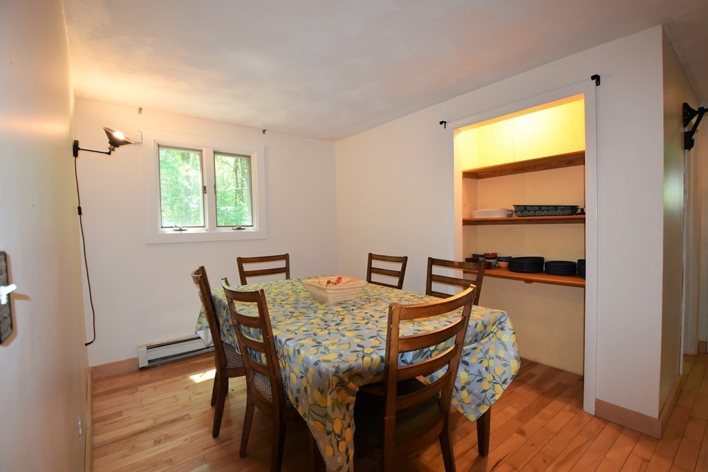 20 Amherst Road Hopkinton, MA 01748 - Photo 9 of 27 a view of a dining room with furniture and a window