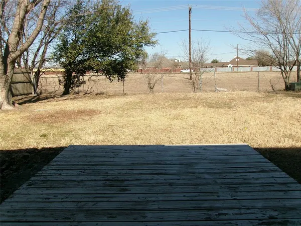 a view of yard covered with snow