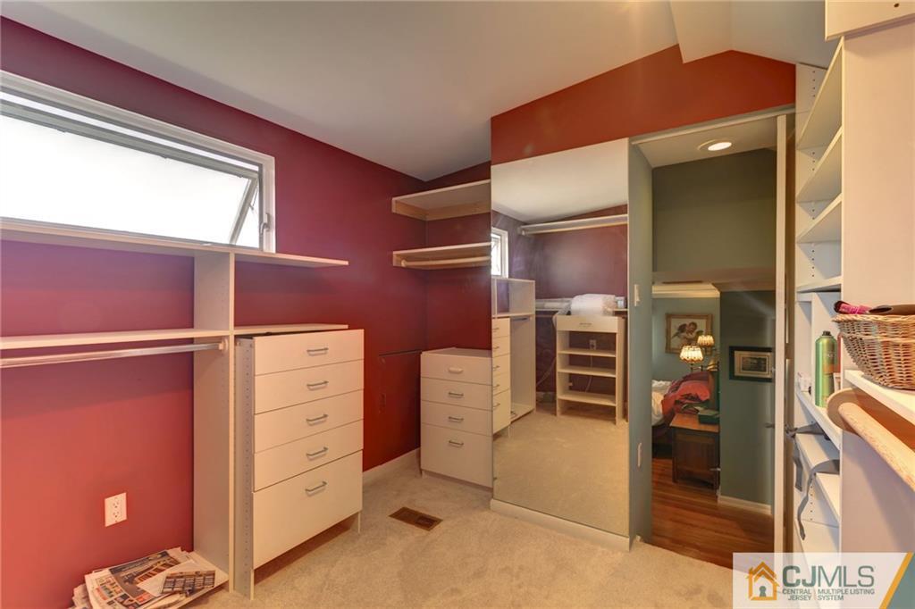 77 Rolling Hills Road Clifton, NJ 07013 - Photo 11 of 16 a view of an empty room and window