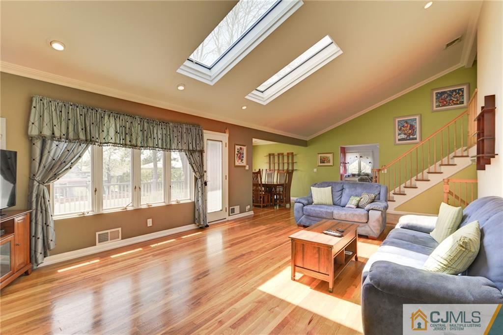 77 Rolling Hills Road Clifton, NJ 07013 - Photo 4 of 16 a living room with furniture and a large window