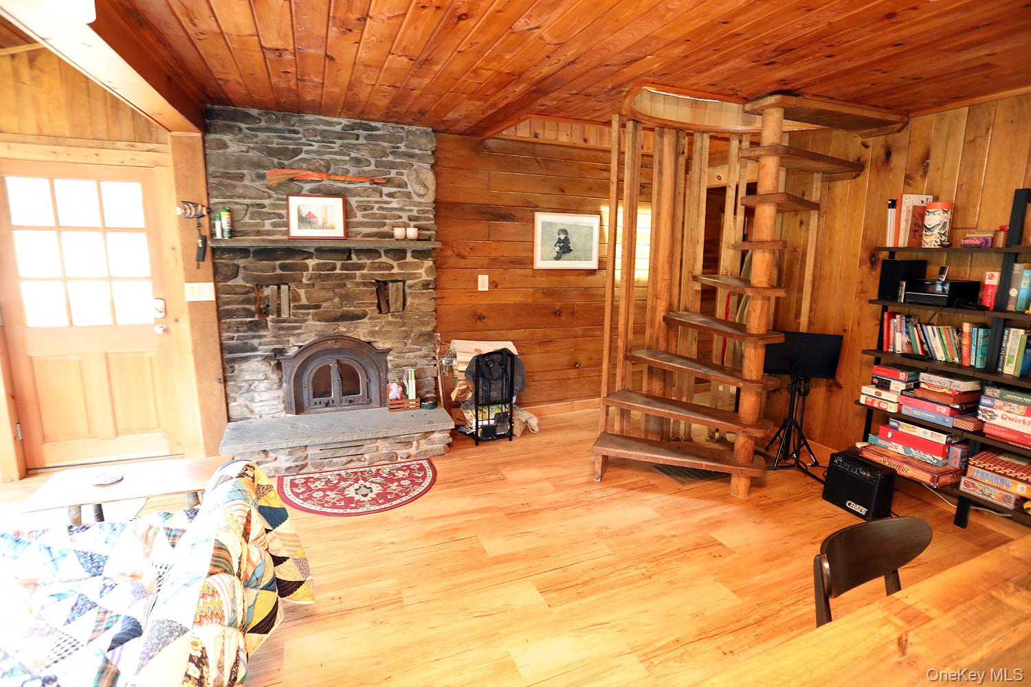 5120 Peas Eddy Road Hancock, NY 13783 - Photo 14 of 37 a room with furniture and a flat screen tv