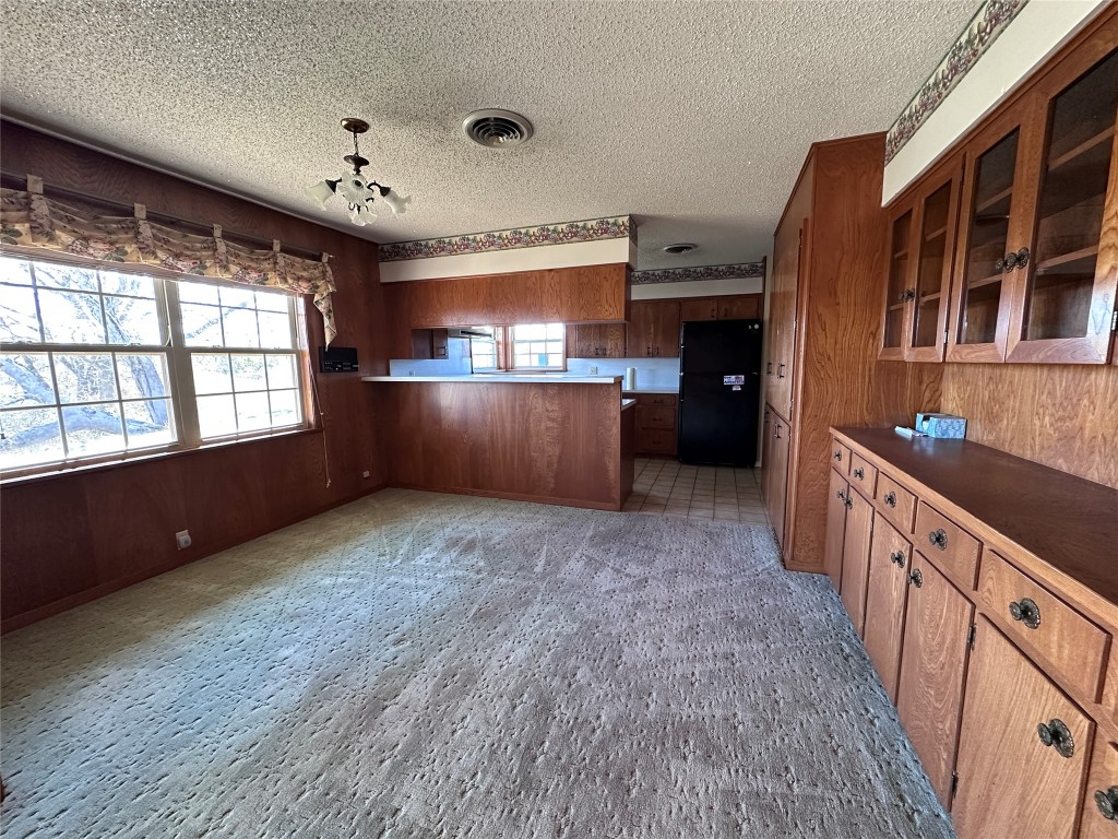 180 Griesenbeck Ranch Road Bastrop, TX 78602 - Photo 7 of 19 wooden floor in an empty room with a window