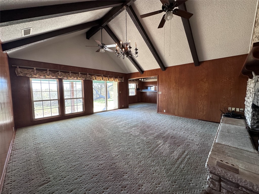 180 Griesenbeck Ranch Road Bastrop, TX 78602 - Photo 8 of 19 a view of a livingroom with furniture and staircase
