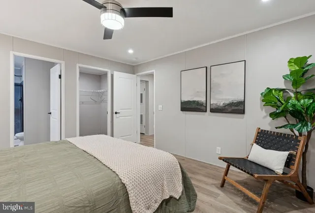a bathroom with a shower sink and mirror
