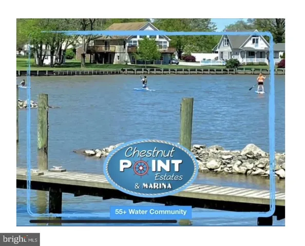 a dining room with furniture and chandelier