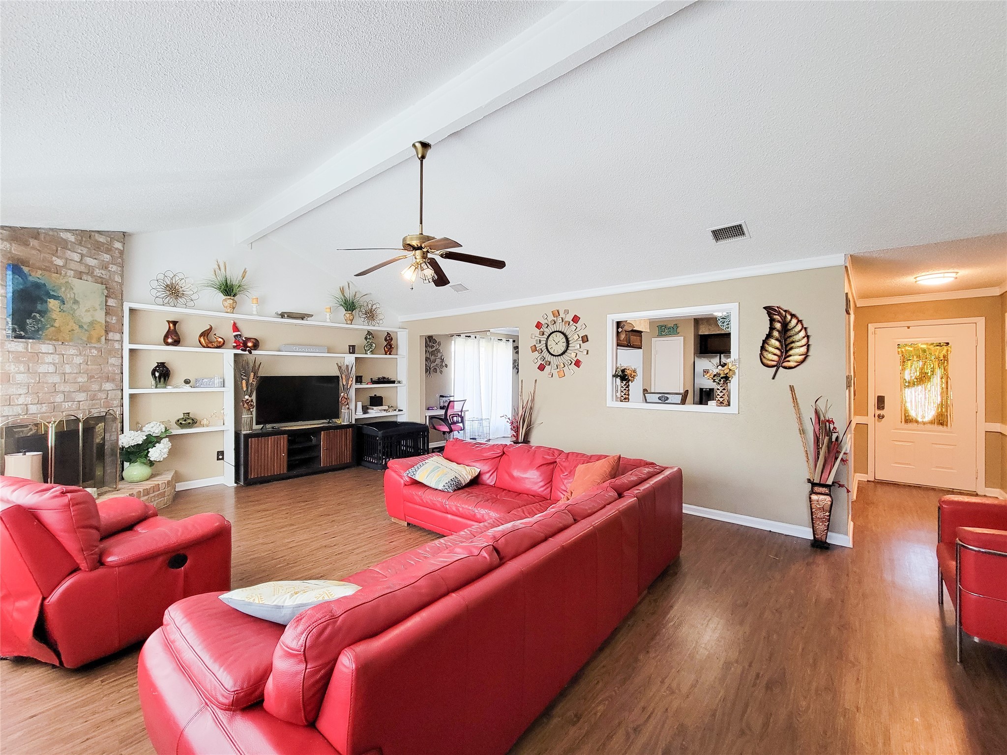5414 Sweetwind Lane Spring, TX 77373 - Photo 28 of 30 a bedroom with furniture and a wooden floor