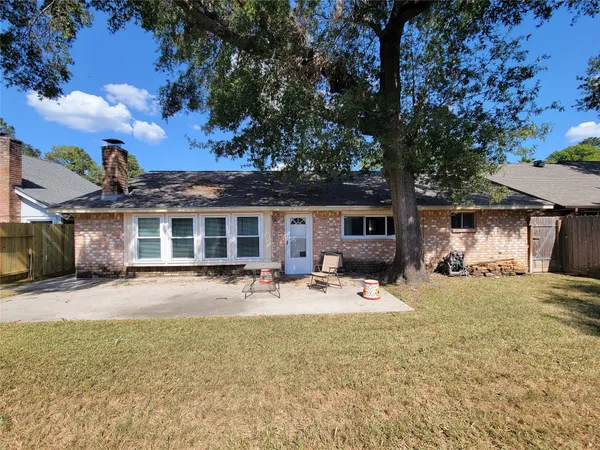 a front view of a house with patio