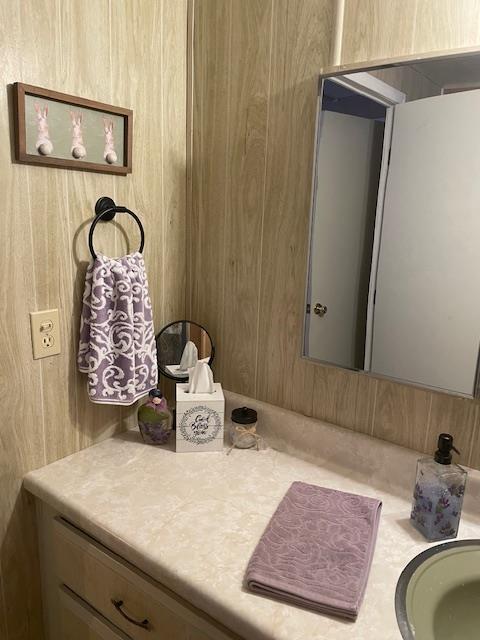 4125 Mchenry Avenue, Unit 35 Modesto, CA 95356 - Photo 10 of 20 a bathroom with a sink and a mirror