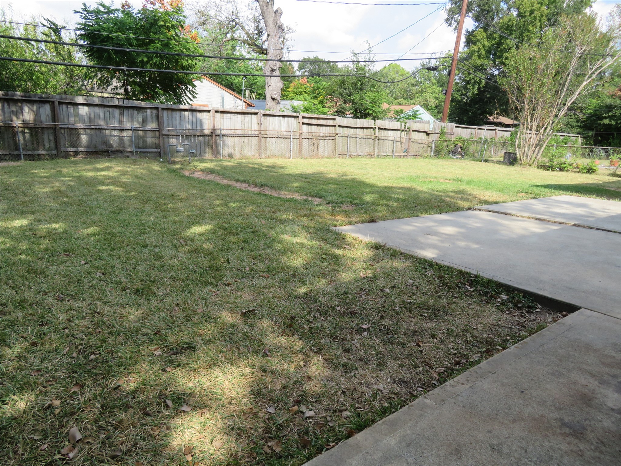 5818 Carew Street Houston, TX 77074 - Photo 16 of 16 a view of a backyard
