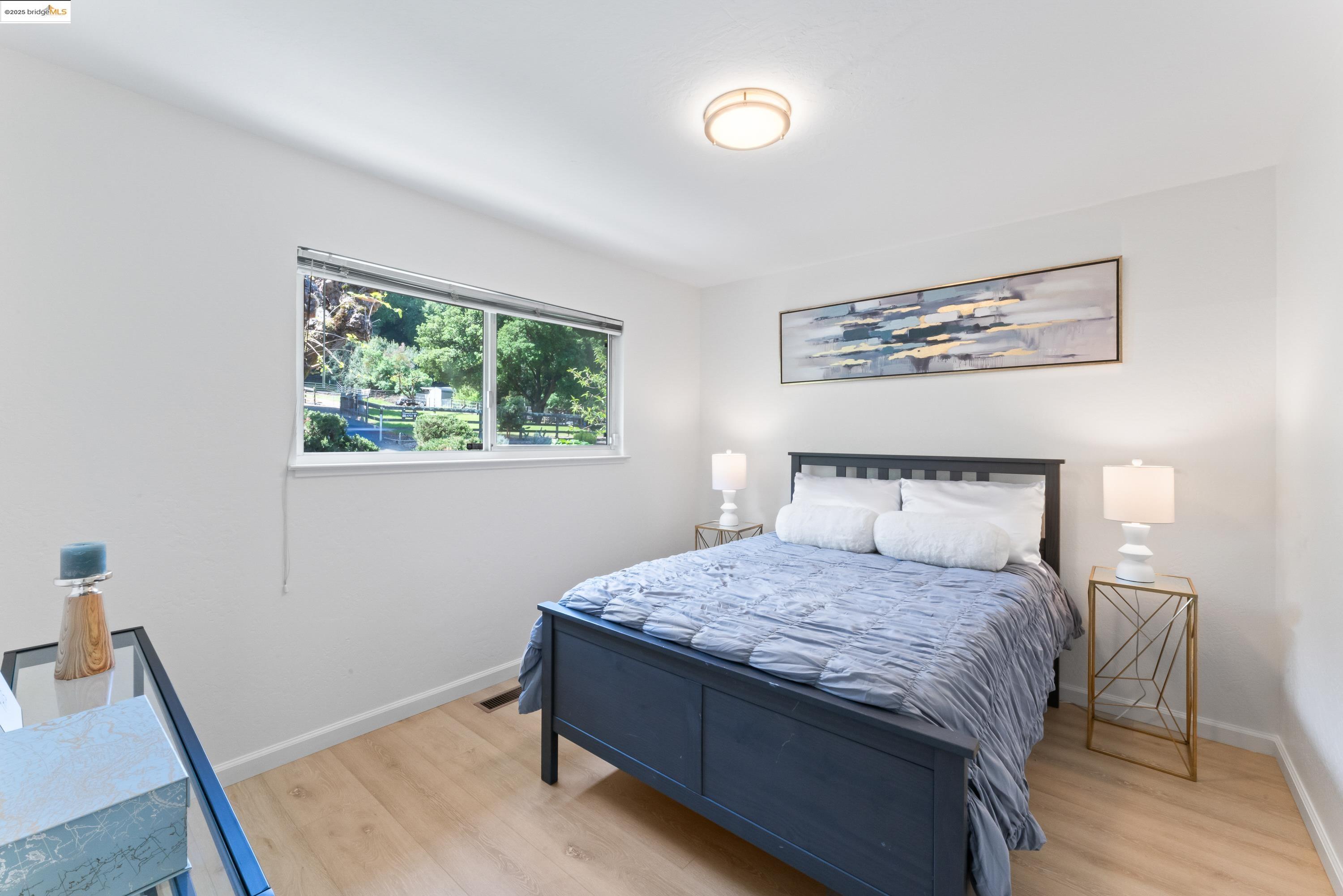 2305 Marlin Court Pinole, CA 94564 - Photo 17 of 31 a bedroom with a bed and a window