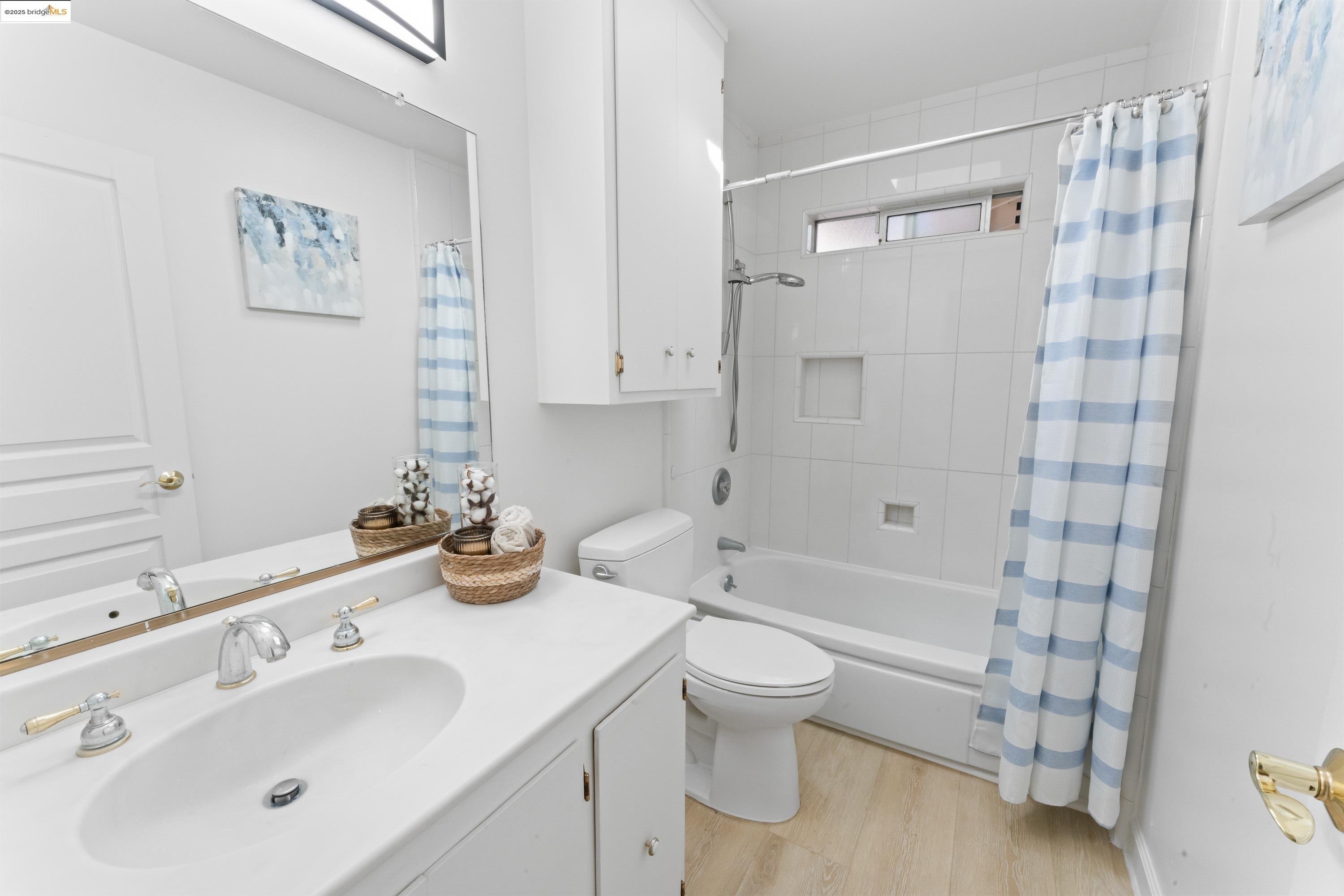 2305 Marlin Court Pinole, CA 94564 - Photo 21 of 31 a bathroom with a sink toilet and shower