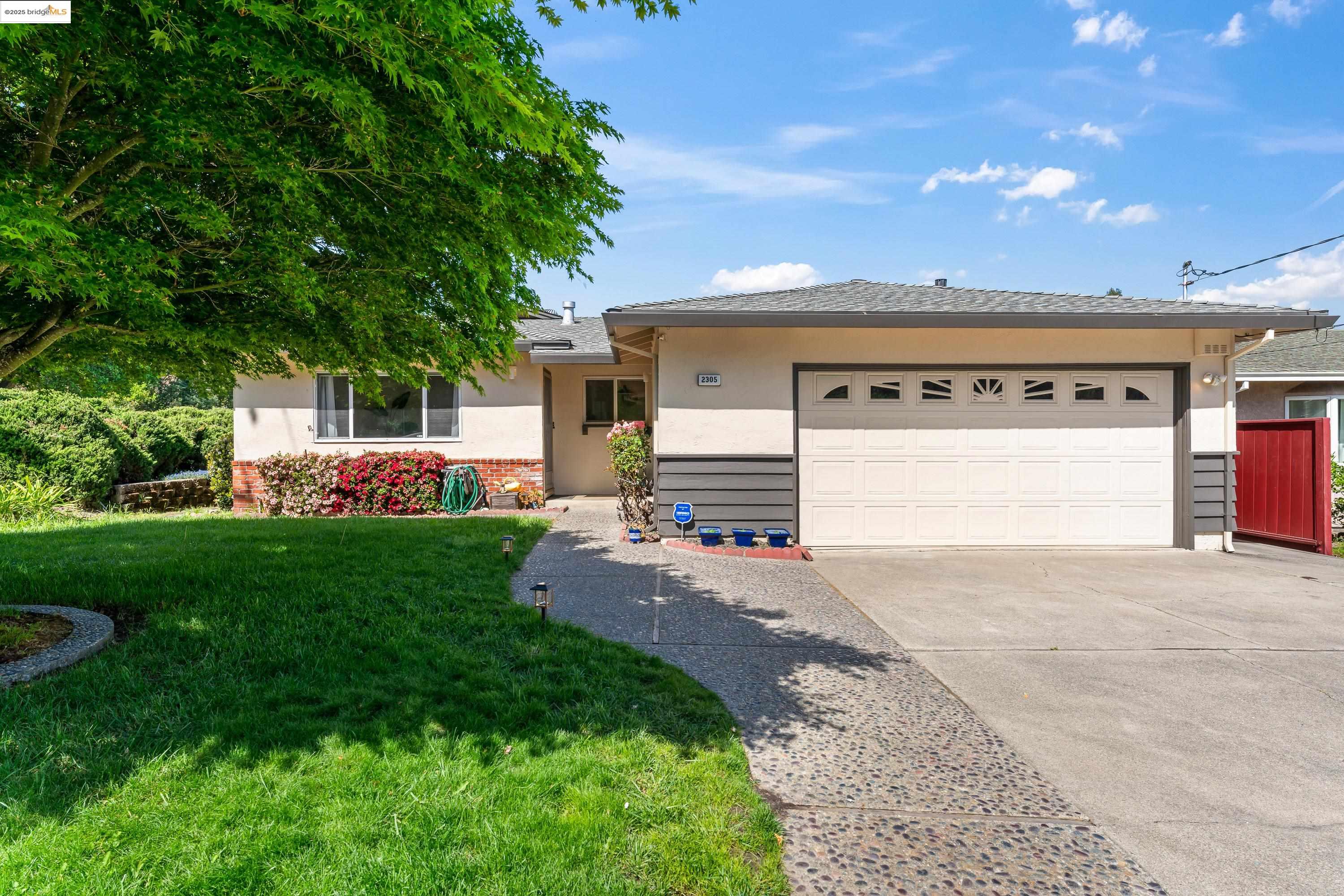 2305 Marlin Court Pinole, CA 94564 - Photo 22 of 31 a house view with a garden space