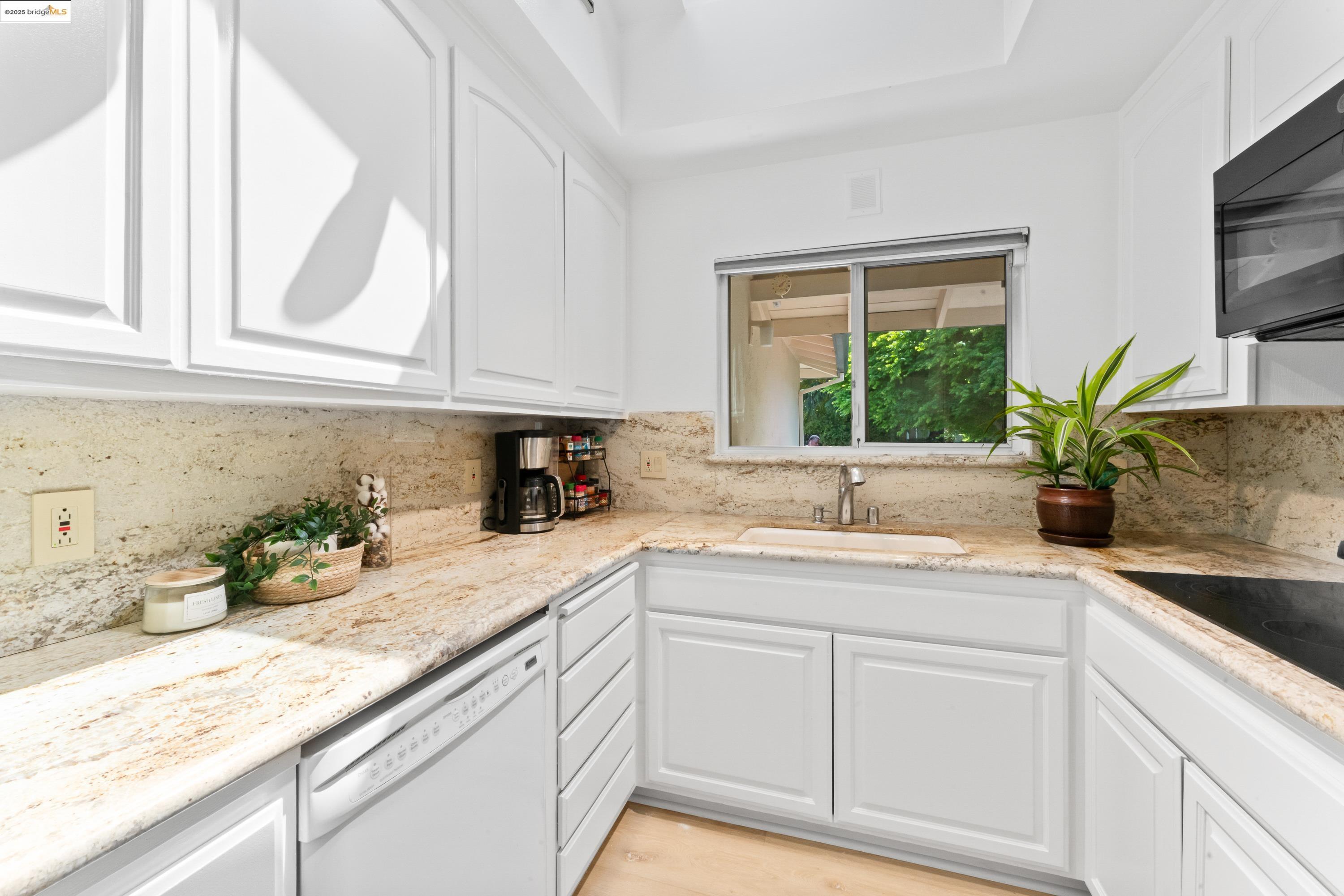 2305 Marlin Court Pinole, CA 94564 - Photo 9 of 31 a kitchen with sink and window