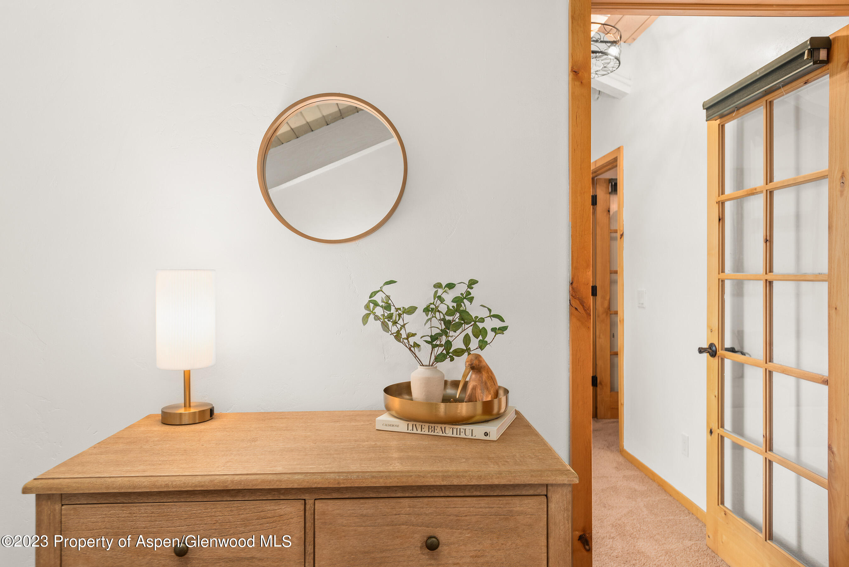 55 Upper Woodbridge Road, Unit G3 Snowmass Village, CO 81615 - Photo 27 of 44 a bathroom with a sink and a mirror