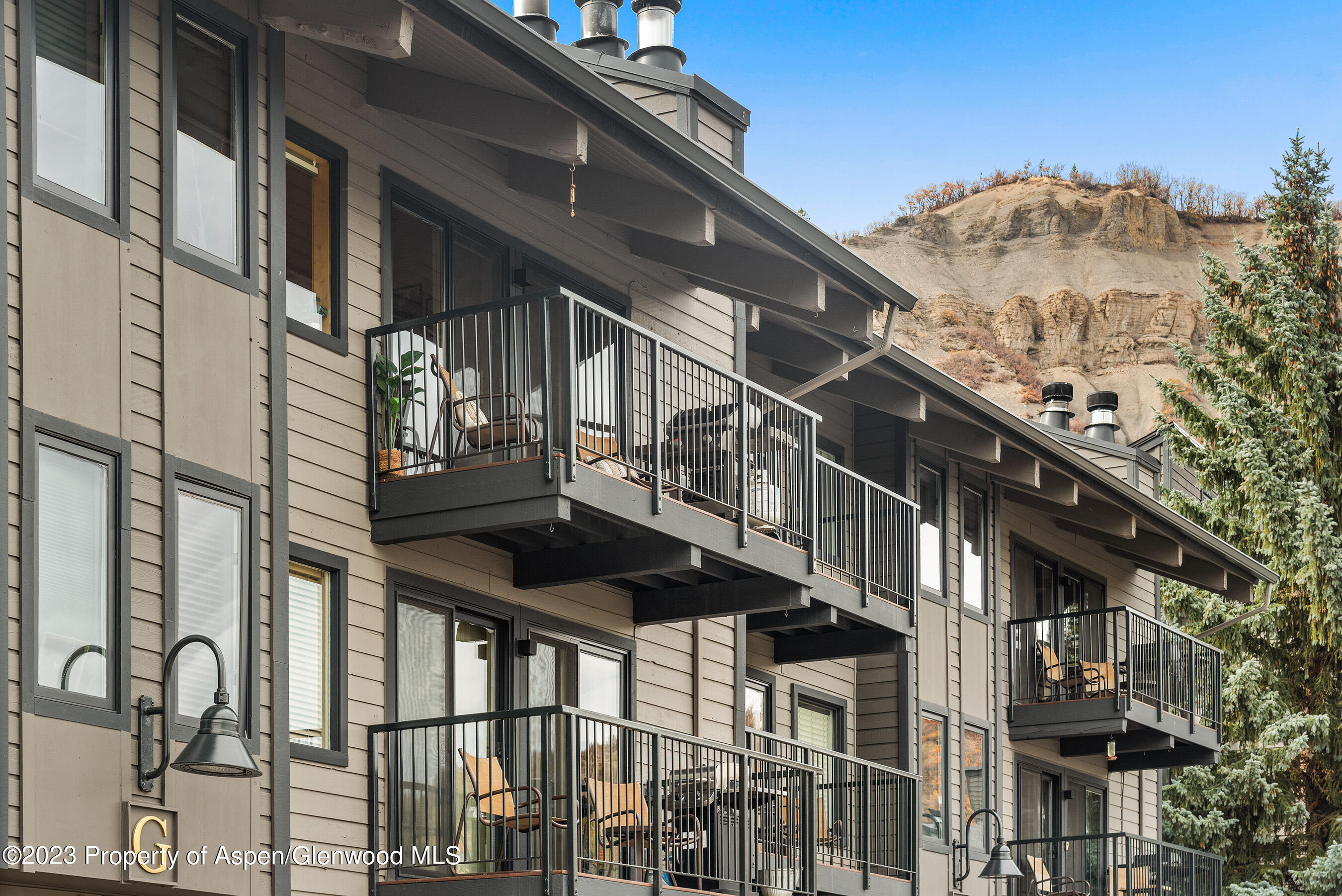 55 Upper Woodbridge Road, Unit G3 Snowmass Village, CO 81615 - Photo 39 of 44 a picture of a building with a street