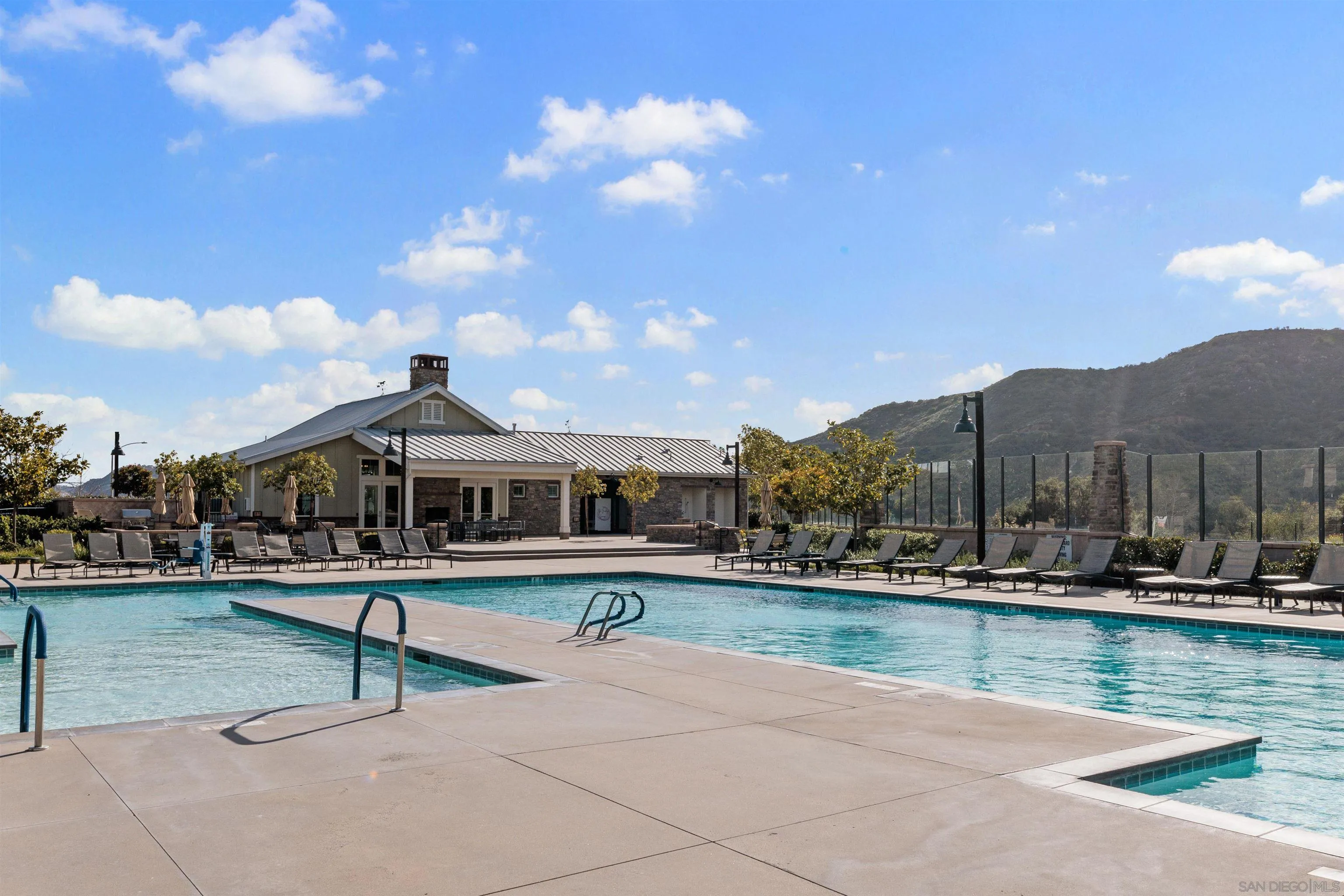 35835 Bay Sable Lane Fallbrook, CA 92028 - Photo 41 of 43 a swimming pool with outdoor seating and yard