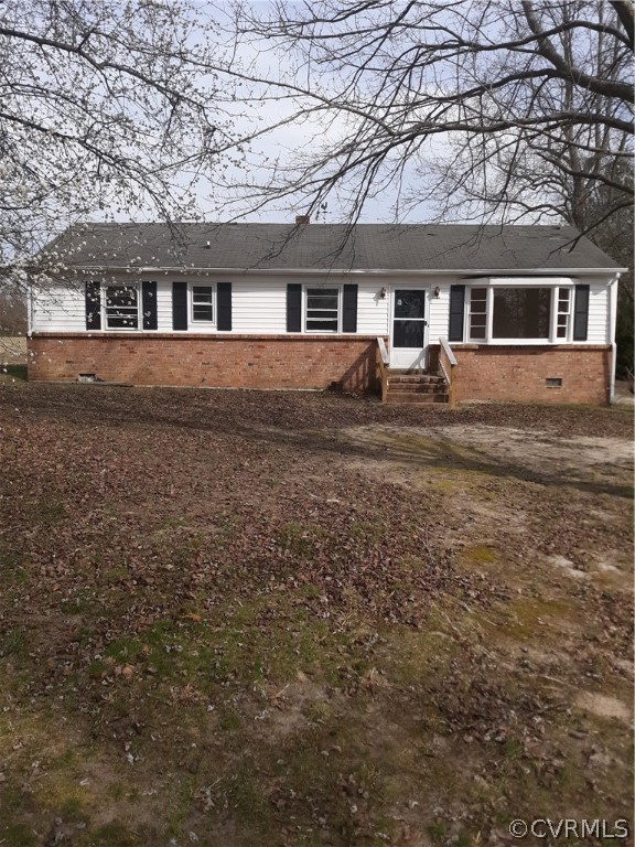 244 Bradley Farm Road Newtown, VA 23126 - Photo 1 of 14 front view of a house with a yard