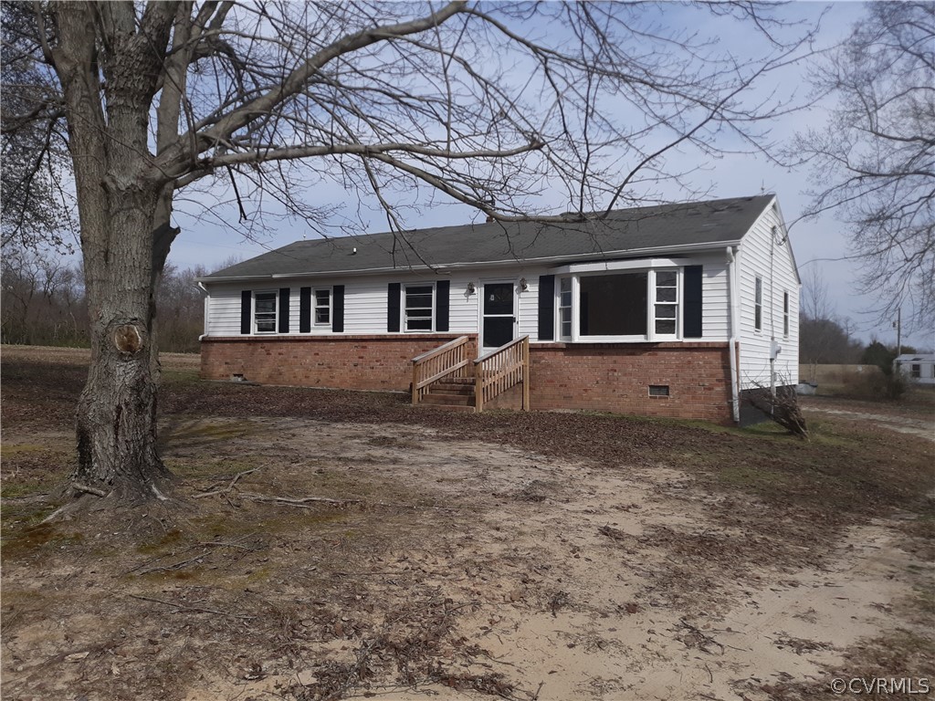 244 Bradley Farm Road Newtown, VA 23126 - Photo 12 of 14 a front view of a house with a yard