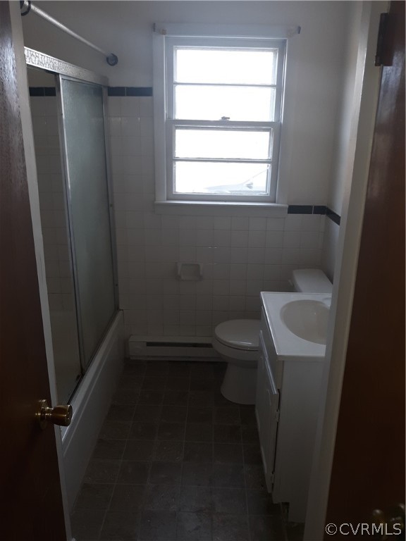 244 Bradley Farm Road Newtown, VA 23126 - Photo 3 of 14 a bathroom with a toilet a sink a window and a shower