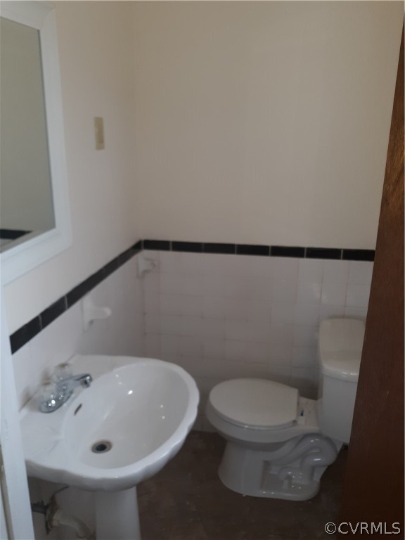 244 Bradley Farm Road Newtown, VA 23126 - Photo 6 of 14 a bathroom with a sink and a mirror