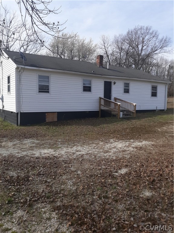 244 Bradley Farm Road Newtown, VA 23126 - Photo 7 of 14 a front view of a house with garden