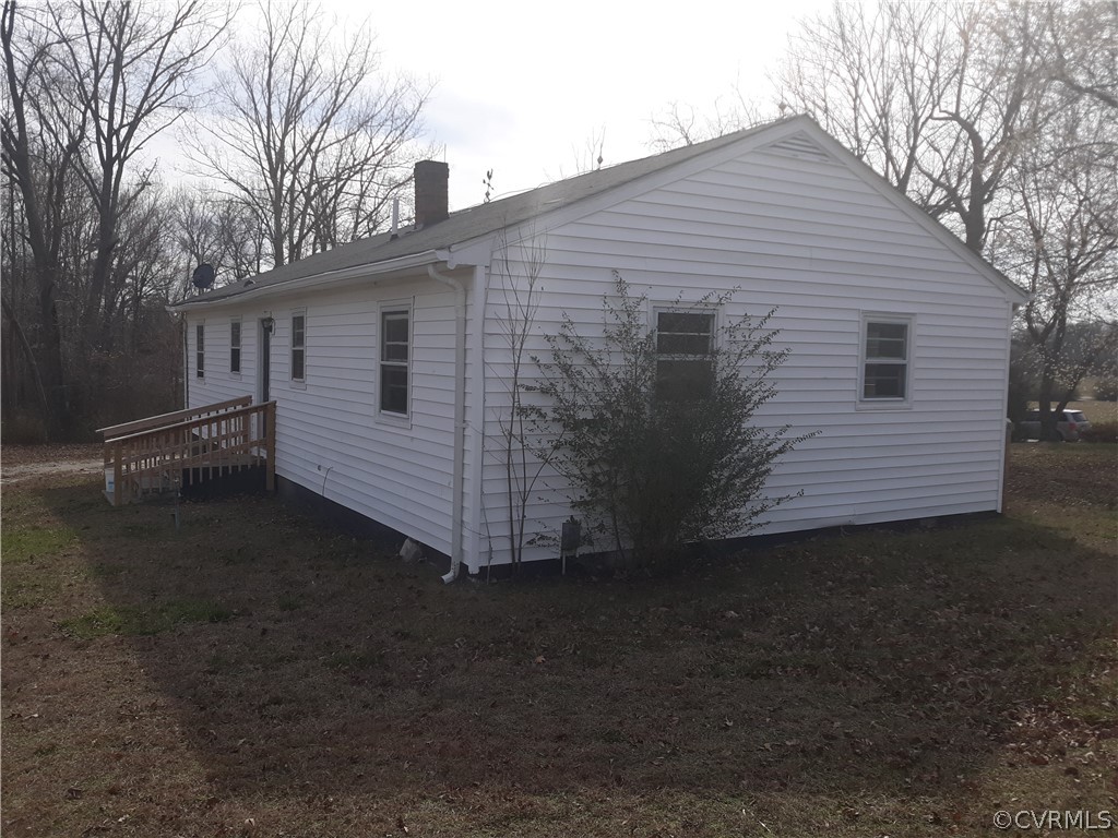 244 Bradley Farm Road Newtown, VA 23126 - Photo 9 of 14 a view of a house with a yard