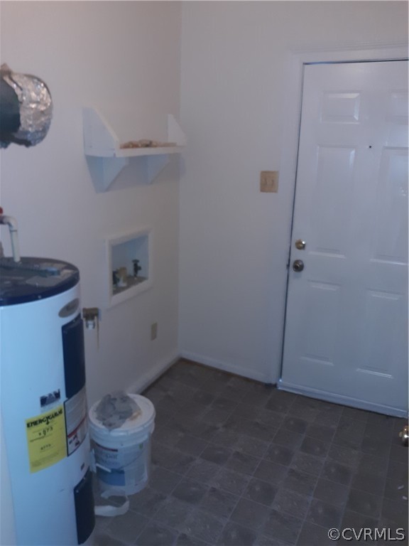 244 Bradley Farm Road Newtown, VA 23126 - Photo 10 of 14 a white toilet sitting next to a bathroom sink and vanity