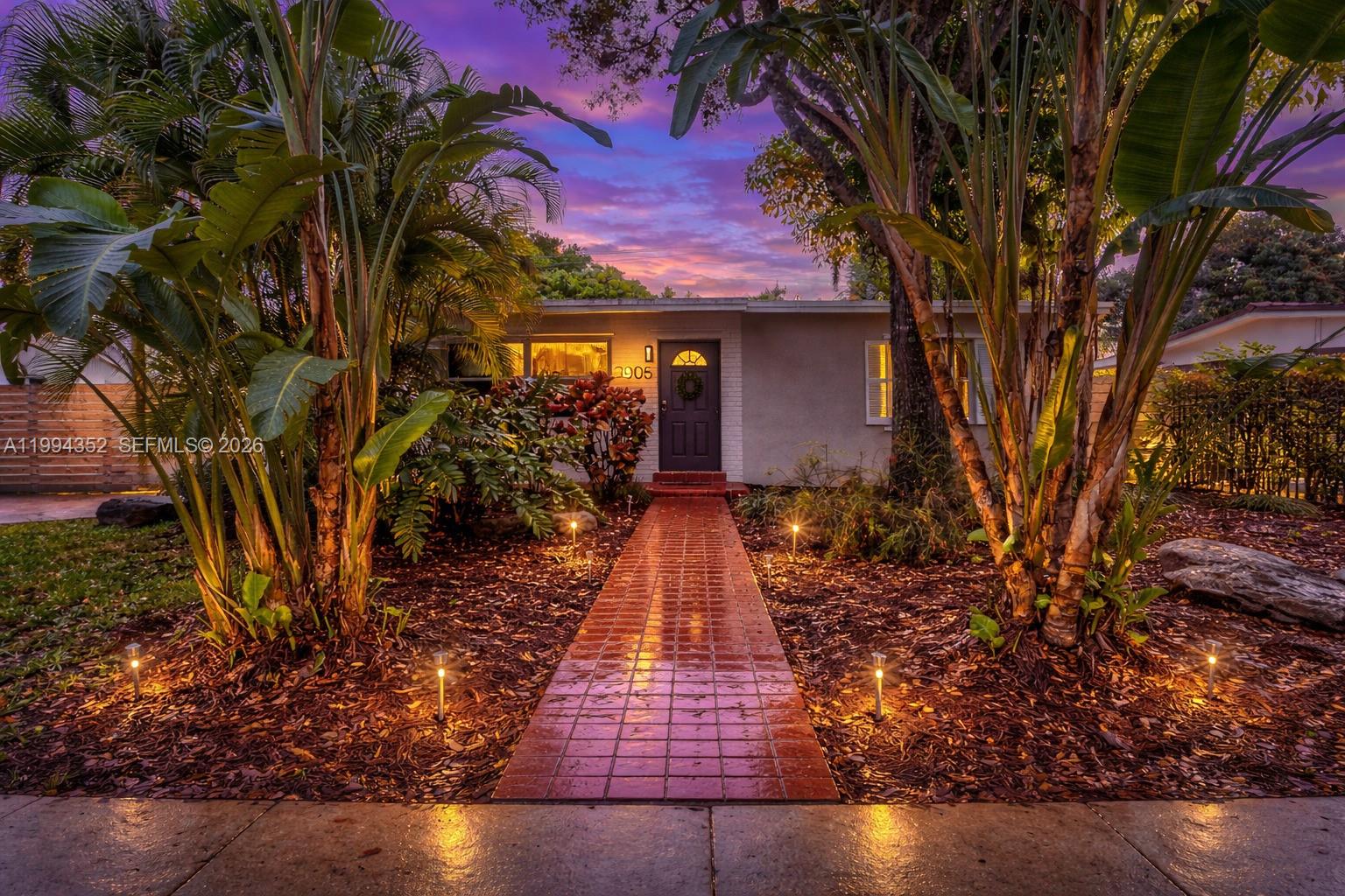 2905 Southwest 93rd Court Miami, FL 33165 - Photo 1 of 46 a front view of a house with a yard