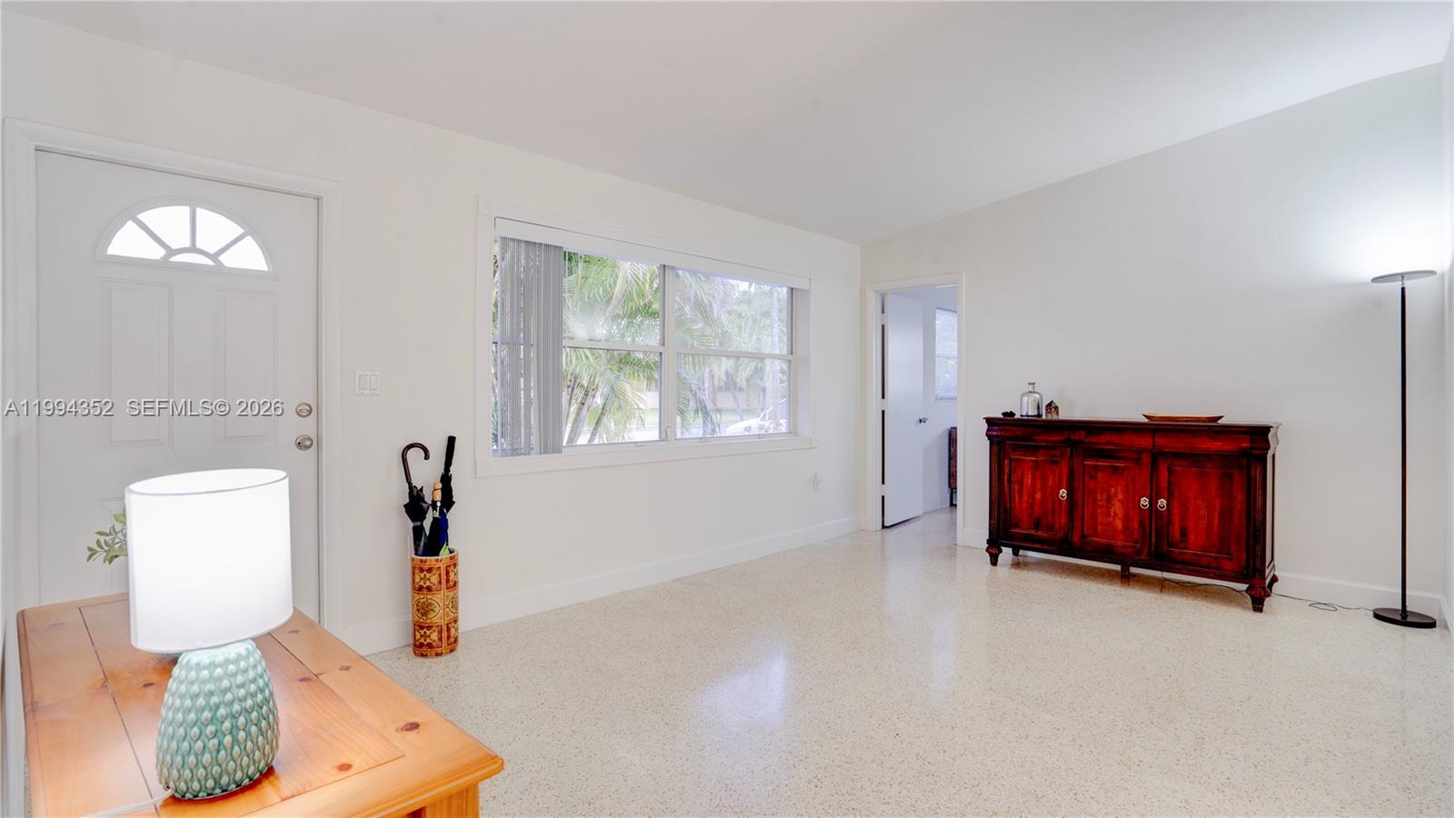 2905 Southwest 93rd Court Miami, FL 33165 - Photo 11 of 46 a living room with furniture and a window