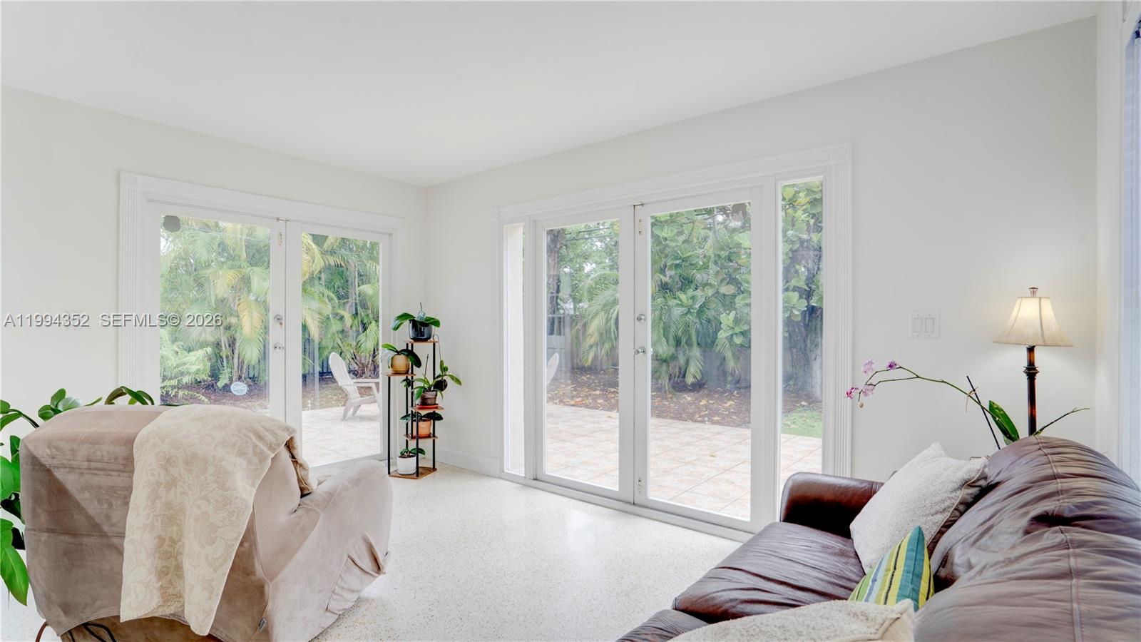2905 Southwest 93rd Court Miami, FL 33165 - Photo 25 of 46 a living room with furniture and a large window