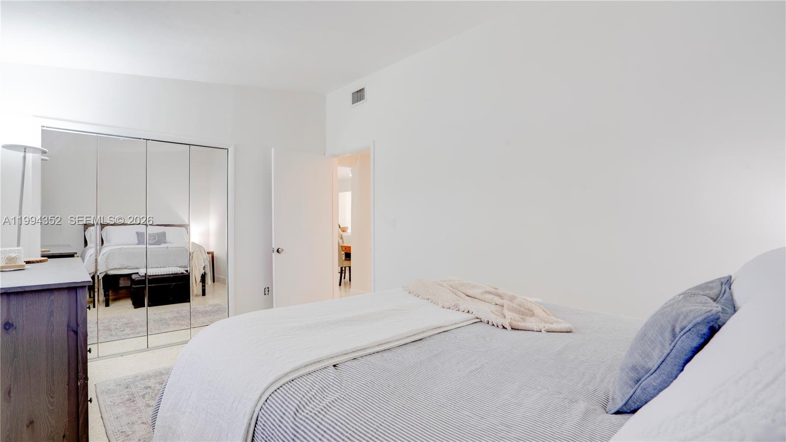 2905 Southwest 93rd Court Miami, FL 33165 - Photo 31 of 46 a bedroom with a bed and a lamp