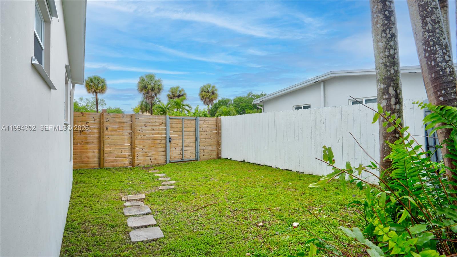 2905 Southwest 93rd Court Miami, FL 33165 - Photo 45 of 46 a view of a backyard with plants