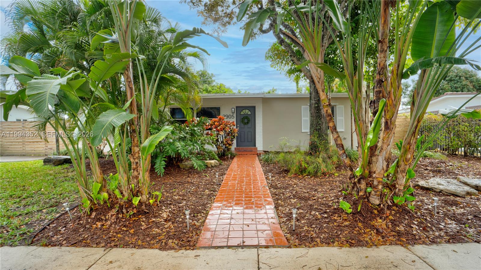2905 Southwest 93rd Court Miami, FL 33165 - Photo 7 of 46 a view of a pathway with plants