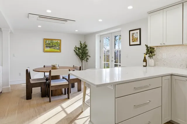 a view of kitchen with furniture and dining table