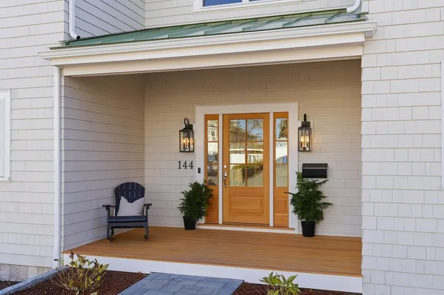 a view of a door and chair and door in the balcony