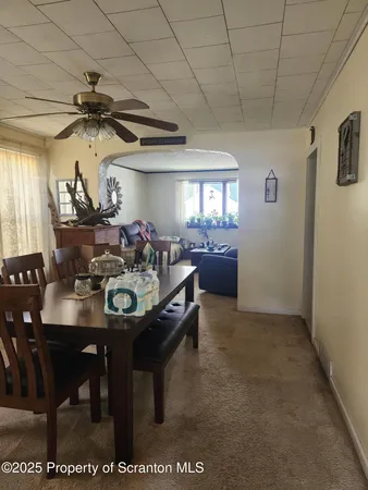 a view of a dining room with furniture