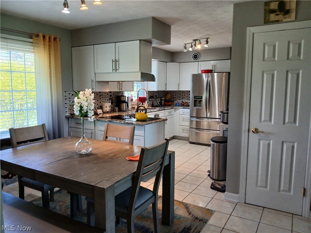 13872 Patch Road Burton, OH 44021 - Photo 9 of 33 Dining is conveniently next to kitchen.